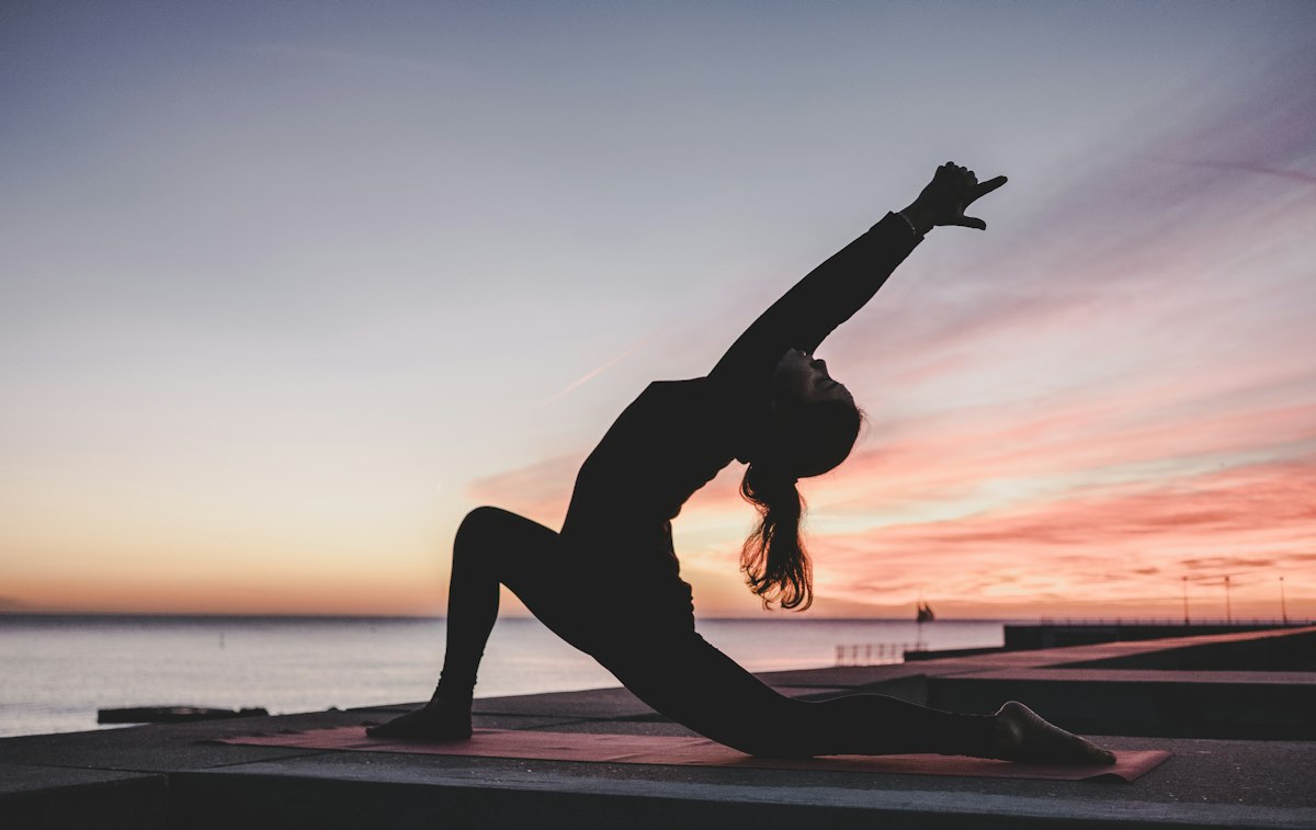 People practising yoga together in a calm studio